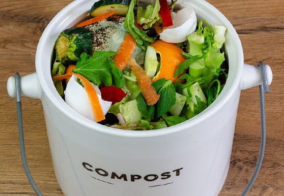 Ceramic pot of compostable food scraps